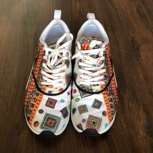 Women’s size 10 Nike Air Max Thea sneakers.